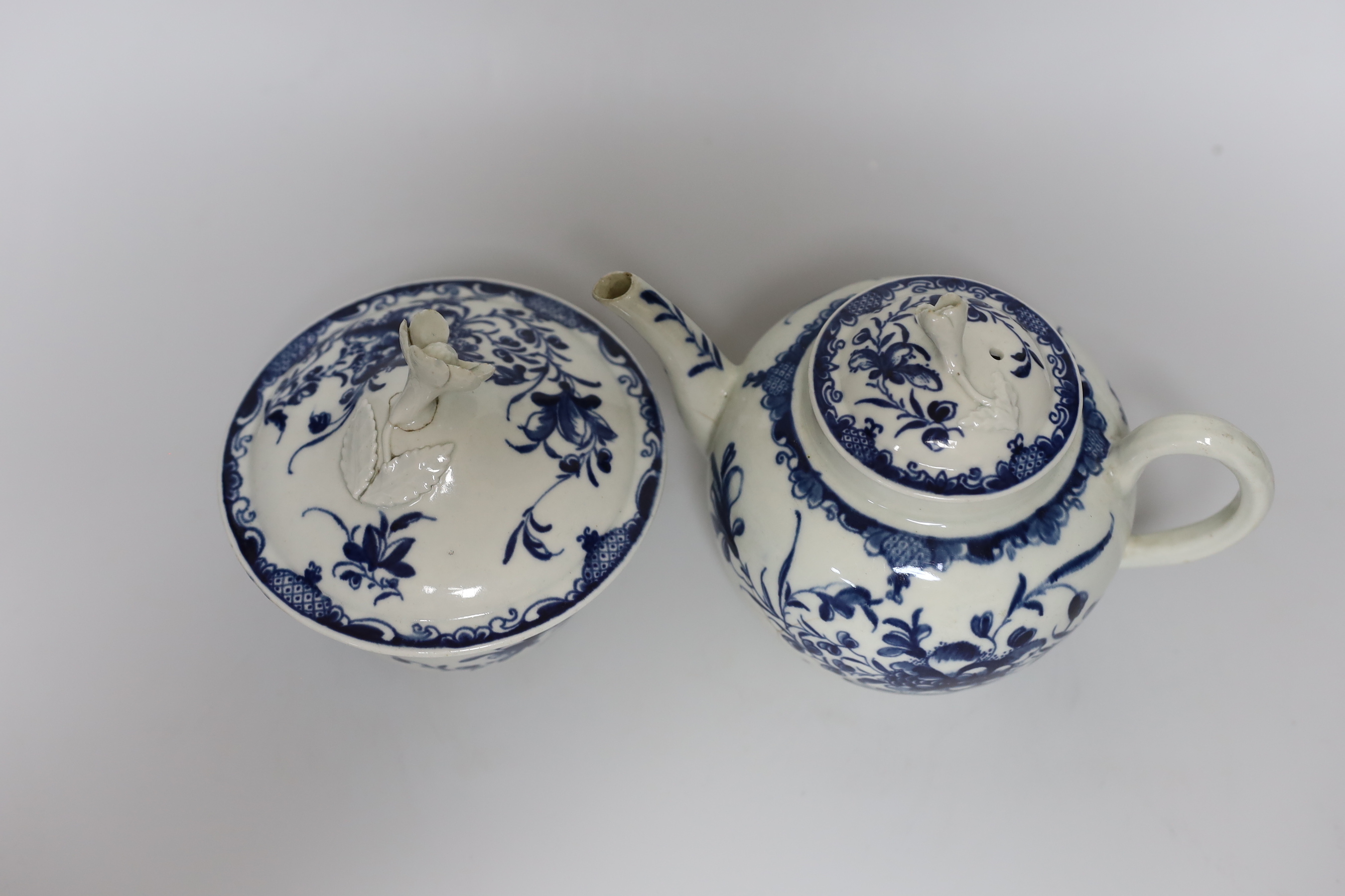 An early Worcester sucrier and cover painted with the Mansfield pattern, and a teapot and cover in the same pattern, c.1760, tallest 13cm
